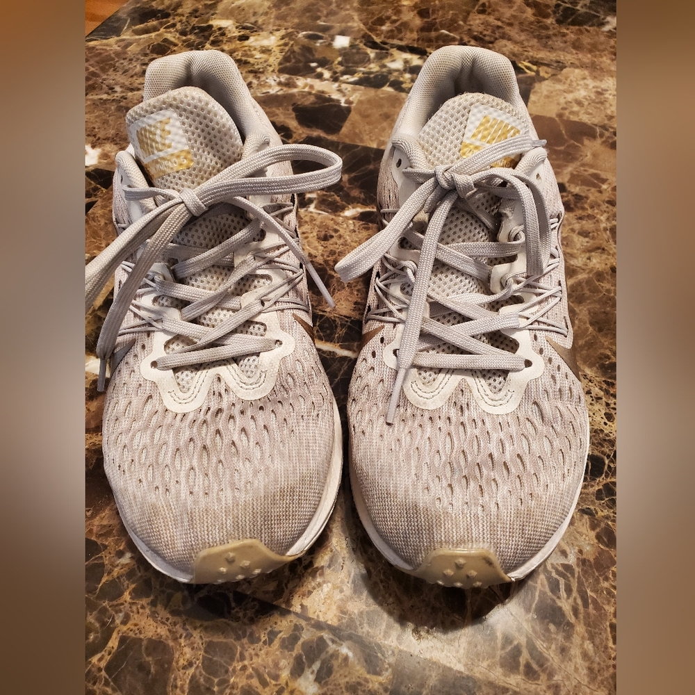 Nike Gray and Gold Athletic Shoes with Textured Design